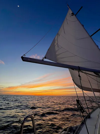 Monlove Yacht Photos Pics Sailing at sunset on a 2007 Beneteau Oceanis Clipper 393 yacht.