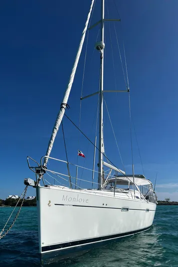 Monlove Yacht Photos Pics 2007 Beneteau Oceanis Clipper 393 sailboat on clear blue water under sunny sky.