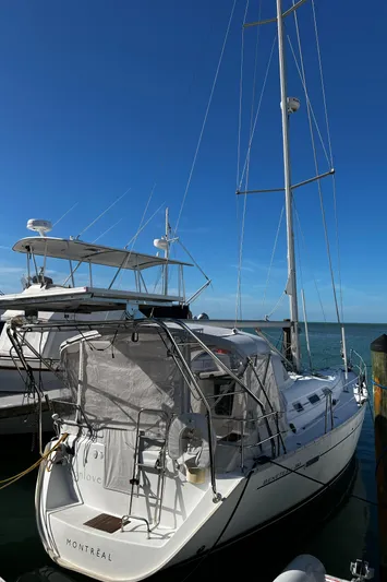 Monlove Yacht Photos Pics 2007 Beneteau Oceanis Clipper 393 sailboat docked under clear blue sky.