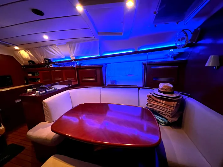 Monlove Yacht Photos Pics Interior of 2007 Beneteau Oceanis Clipper 393 yacht with cozy seating and ambient lighting.