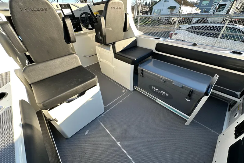  Yacht Photos Pics Interior of 2026 Sealegs 8.5m Cabin boat with seating and storage.