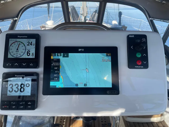 Chandelle Yacht Photos Pics Navigation instruments on 2008 Alubat OVNI 435 yacht, featuring Raymarine displays and a central map screen.