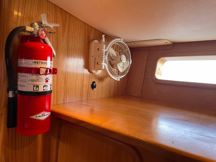 Chandelle Yacht Photos Pics Interior of 2008 Alubat OVNI 435 yacht with fire extinguisher and fan.
