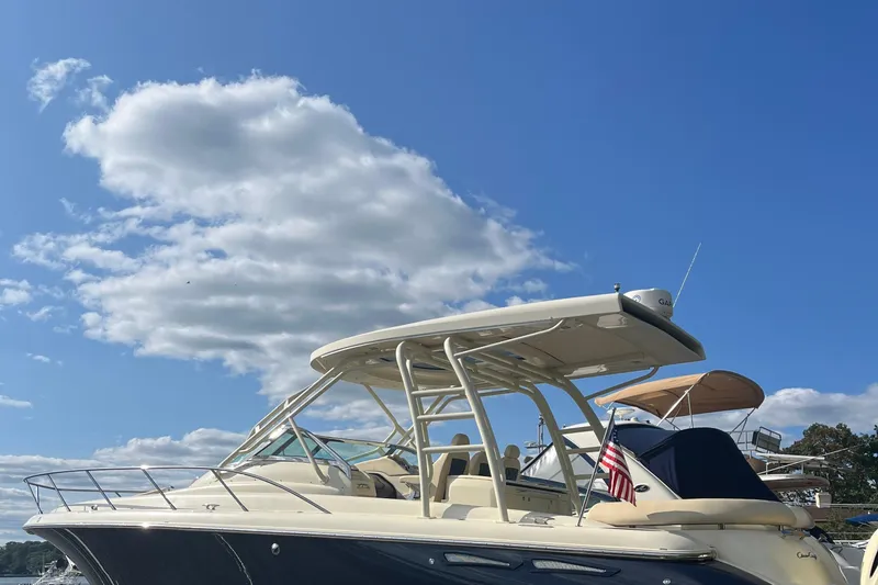  Yacht Photos Pics 2016 Chris-Craft Launch 36 boat under a clear blue sky with clouds.