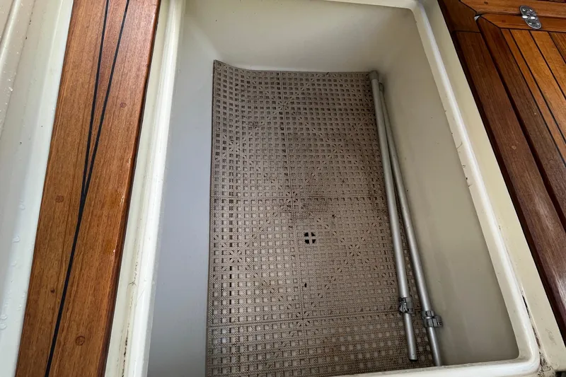  Yacht Photos Pics Storage compartment on 2016 Chris-Craft Launch 36 boat with wooden trim.