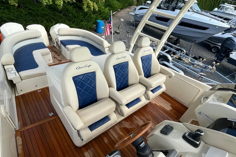  Yacht Photos Pics Luxurious 2016 Chris-Craft Launch 36 boat interior with elegant seating and wooden deck.