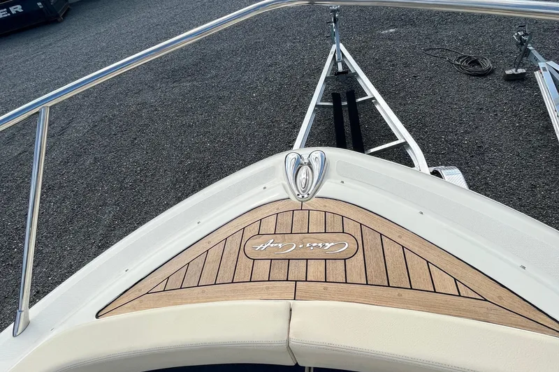  Yacht Photos Pics 2016 Chris-Craft Launch 36 boat bow with teak decking and logo.