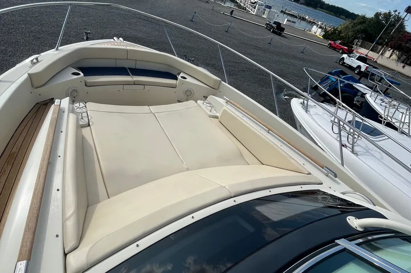  Yacht Photos Pics 2016 Chris-Craft Launch 36 boat with spacious deck and seating, docked near waterfront.