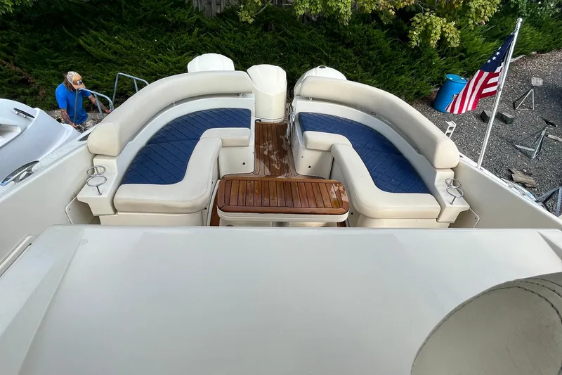  Yacht Photos Pics 2016 Chris-Craft Launch 36 boat interior with seating and American flag.