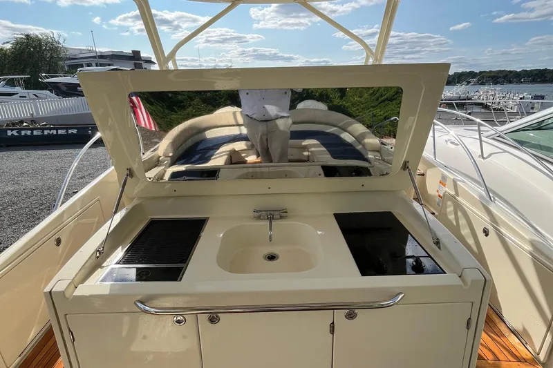  Yacht Photos Pics 2016 Chris-Craft Launch 36 boat with outdoor kitchen and seating area.