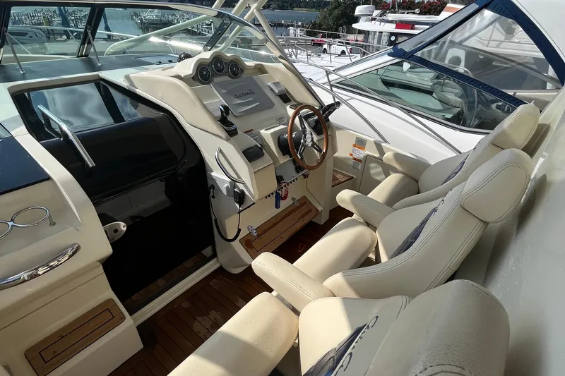  Yacht Photos Pics 2016 Chris-Craft Launch 36 cockpit with luxurious seating and modern navigation controls.