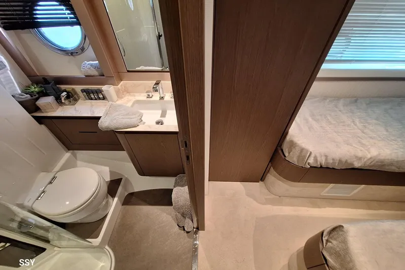 Soul Yacht Photos Pics Luxurious bathroom and bedroom interior of 2022 Azimut Magellano 66 yacht.