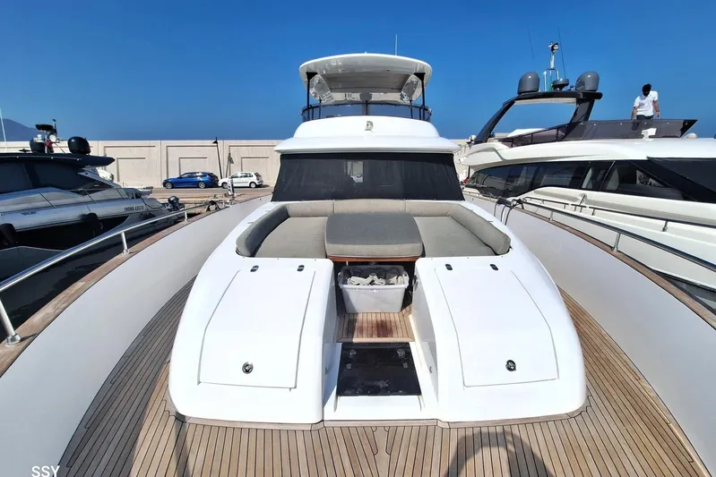 Soul Yacht Photos Pics 2022 Azimut Magellano 66 yacht with spacious deck and seating area in marina.