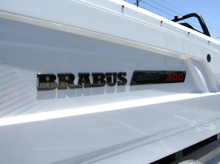  Yacht Photos Pics 2024 BRABUS SHADOW 300 CT logo on sleek white surface.