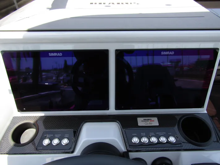  Yacht Photos Pics Dashboard of 2024 BRABUS SHADOW 300 CT with dual Simrad displays and control buttons.