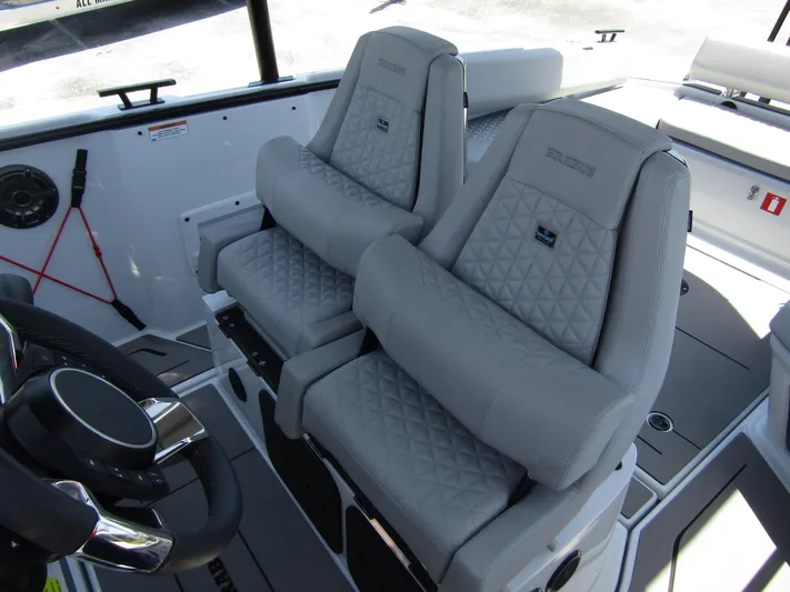  Yacht Photos Pics 2024 BRABUS SHADOW 300 CT luxury boat seats with quilted design and steering wheel.