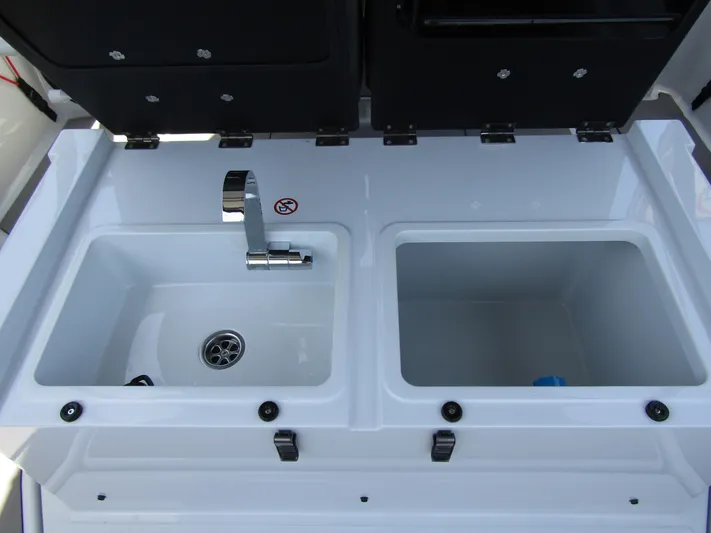  Yacht Photos Pics 2024 BRABUS SHADOW 300 CT boat sink and storage compartments.