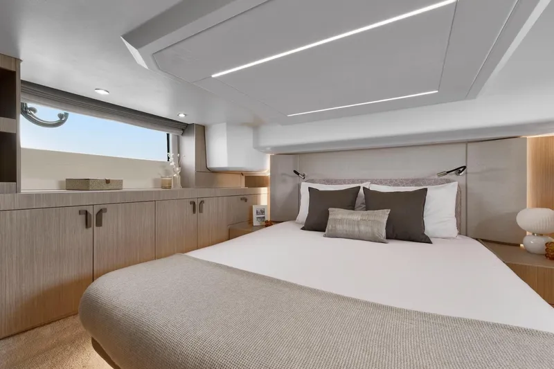  Yacht Photos Pics Luxurious bedroom interior of 2024 Prestige F4.3 yacht with modern design elements.