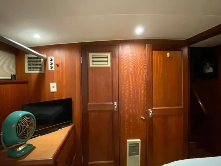 Temptress Yacht Photos Pics Interior of 1971 Hatteras 58 Motor Yacht with wooden walls.