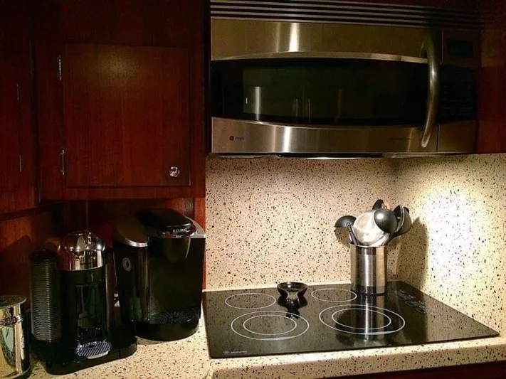 Temptress Yacht Photos Pics 1971 Hatteras 58 Motor Yacht kitchen with modern appliances.