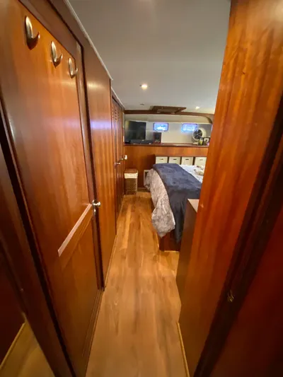 Temptress Yacht Photos Pics Interior of 1971 Hatteras 58 Motor Yacht with wood paneling.