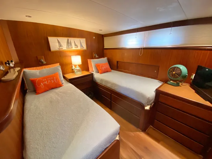 Temptress Yacht Photos Pics Interior of 1971 Hatteras 58 Motor Yacht with twin beds.