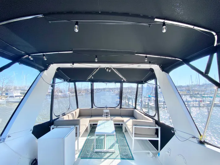 Temptress Yacht Photos Pics Interior of a 1971 Hatteras 58 Motor Yacht with panoramic view.