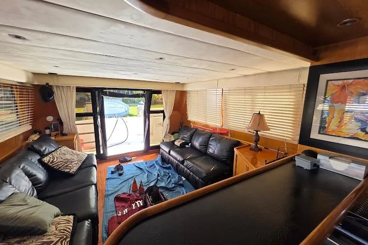  Yacht Photos Pics Luxurious interior of 1993 McKinna 48 Pilothouse with leather seating and elegant decor.