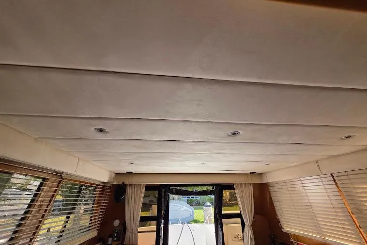  Yacht Photos Pics Interior view of 1993 McKinna 48 Pilothouse yacht with ceiling and windows.