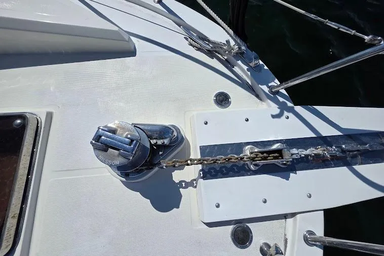  Yacht Photos Pics Anchor chain and windlass on 1993 McKinna 48 Pilothouse yacht deck.