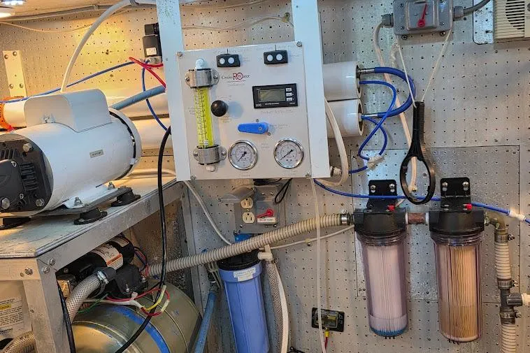  Yacht Photos Pics Engine room of a 1993 McKinna 48 Pilothouse with water filtration system.