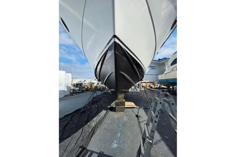  Yacht Photos Pics 1993 McKinna 48 Pilothouse yacht on dry dock, viewed from the bow.