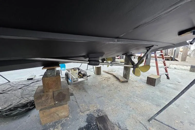  Yacht Photos Pics Underneath view of 1993 McKinna 48 Pilothouse boat on dry dock.