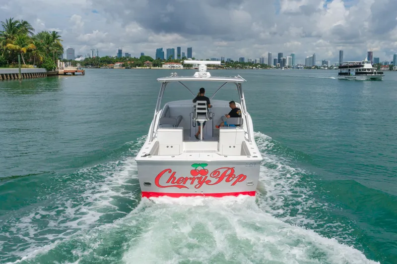  Yacht Photos Pics Buddy Davis 35 Predator 2010 boat Cherry Pop cruising in a scenic bay.