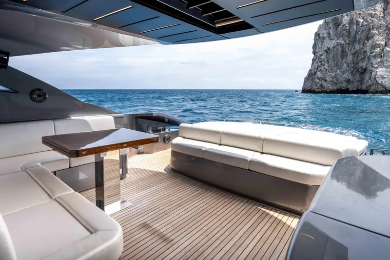 One Spin 2 Yacht Photos Pics Luxurious 2017 Pershing 74 yacht deck with ocean view and elegant seating.