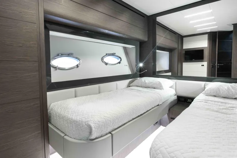 One Spin 2 Yacht Photos Pics Luxurious twin cabin interior on 2017 Pershing 74 yacht with modern design.