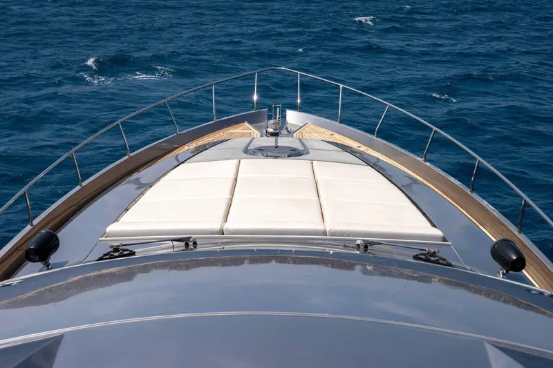 One Spin 2 Yacht Photos Pics 2017 Pershing 74 yacht bow view on open sea.