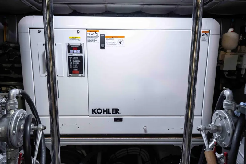 One Spin 2 Yacht Photos Pics Kohler generator in 2017 Pershing 74 yacht engine room.