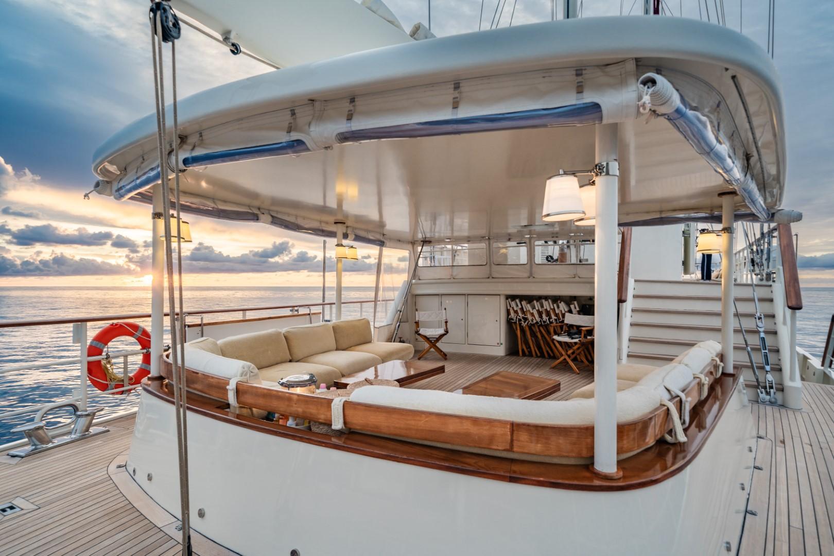 Luxurious yacht deck with seating area at sunset, custom model, 1990.