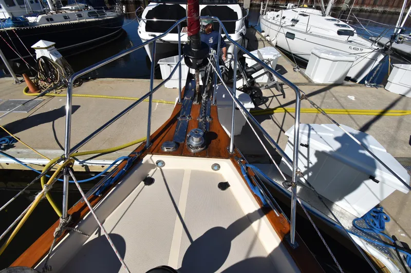 Aftia Yacht Photos Pics Bow view of 1999 Island Packet 380 sailboat docked at marina.