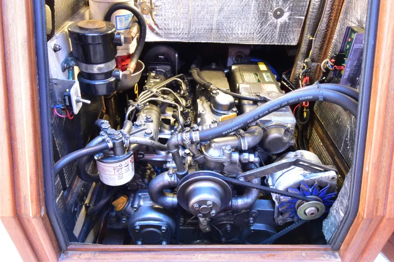 Aftia Yacht Photos Pics Engine compartment of a 1999 Island Packet 380 sailboat, showcasing detailed mechanical components.