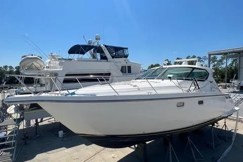  Yacht Photos Pics 2007 Tiara Yachts 4300 Sovran docked under clear blue sky.
