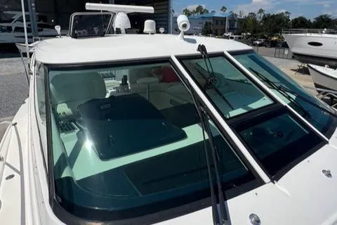  Yacht Photos Pics 2007 Tiara Yachts 4300 Sovran boat with sleek windshield and wipers in marina setting.