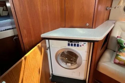  Yacht Photos Pics 2007 Tiara Yachts 4300 Sovran interior with built-in washing machine.