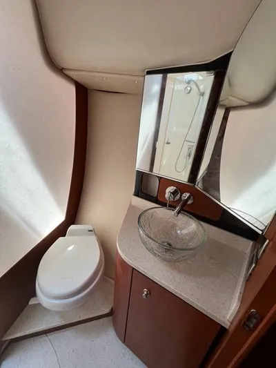  Yacht Photos Pics 2007 Tiara Yachts 4300 Sovran bathroom with modern sink and toilet.