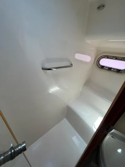  Yacht Photos Pics 2007 Tiara Yachts 4300 Sovran bathroom interior with window and sleek design.