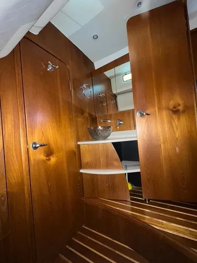  Yacht Photos Pics 2007 Tiara Yachts 4300 Sovran interior with wooden cabinetry and modern design.