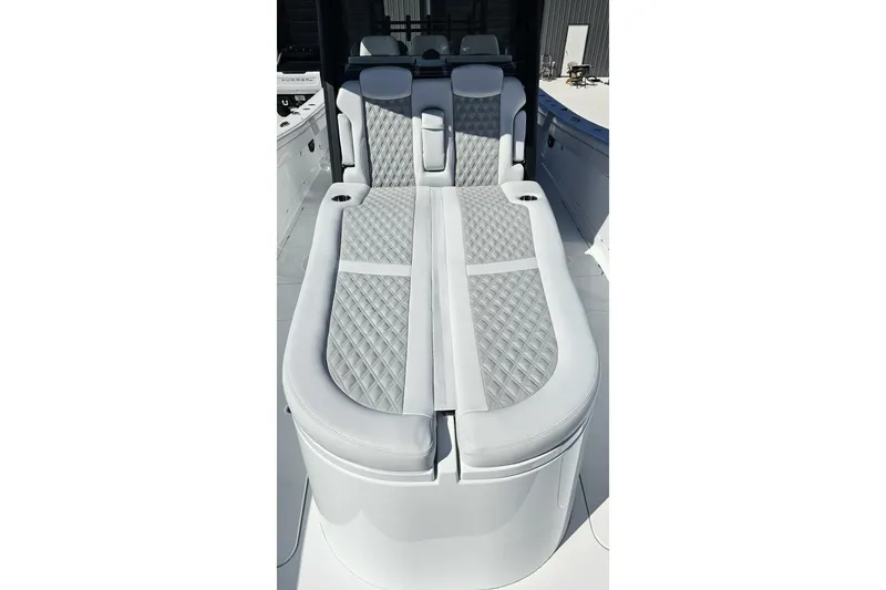  Yacht Photos Pics Luxurious seating on 2025 Costa Custom Boats 34ST, featuring elegant diamond-pattern upholstery.