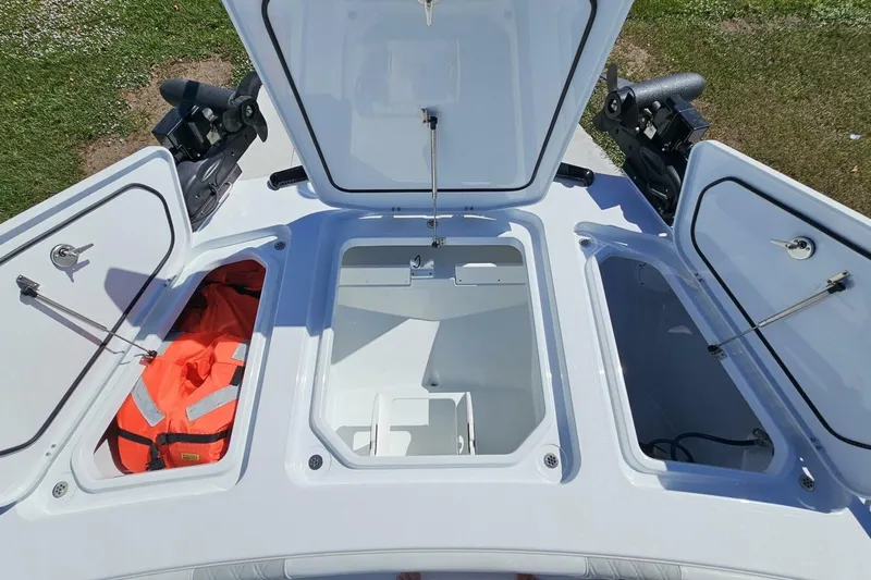  Yacht Photos Pics 2025 Costa Custom Boats 34ST storage compartments with open hatches and safety gear.