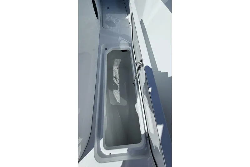  Yacht Photos Pics 2025 Costa Custom Boats 34ST storage compartment, open and empty, showcasing sleek design.